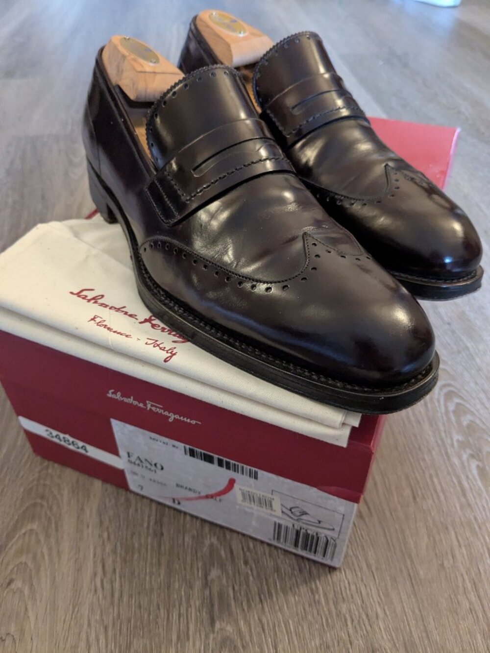 Ferragamo oxblood wingtip penny loafer